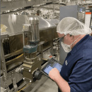 Lubrication Engineers specialist conducts an onsite lubrication reliability
