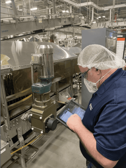 Lubrication Engineers specialist conducts an onsite lubrication reliability